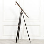 Nickel Telescope on Black Wooden Stand