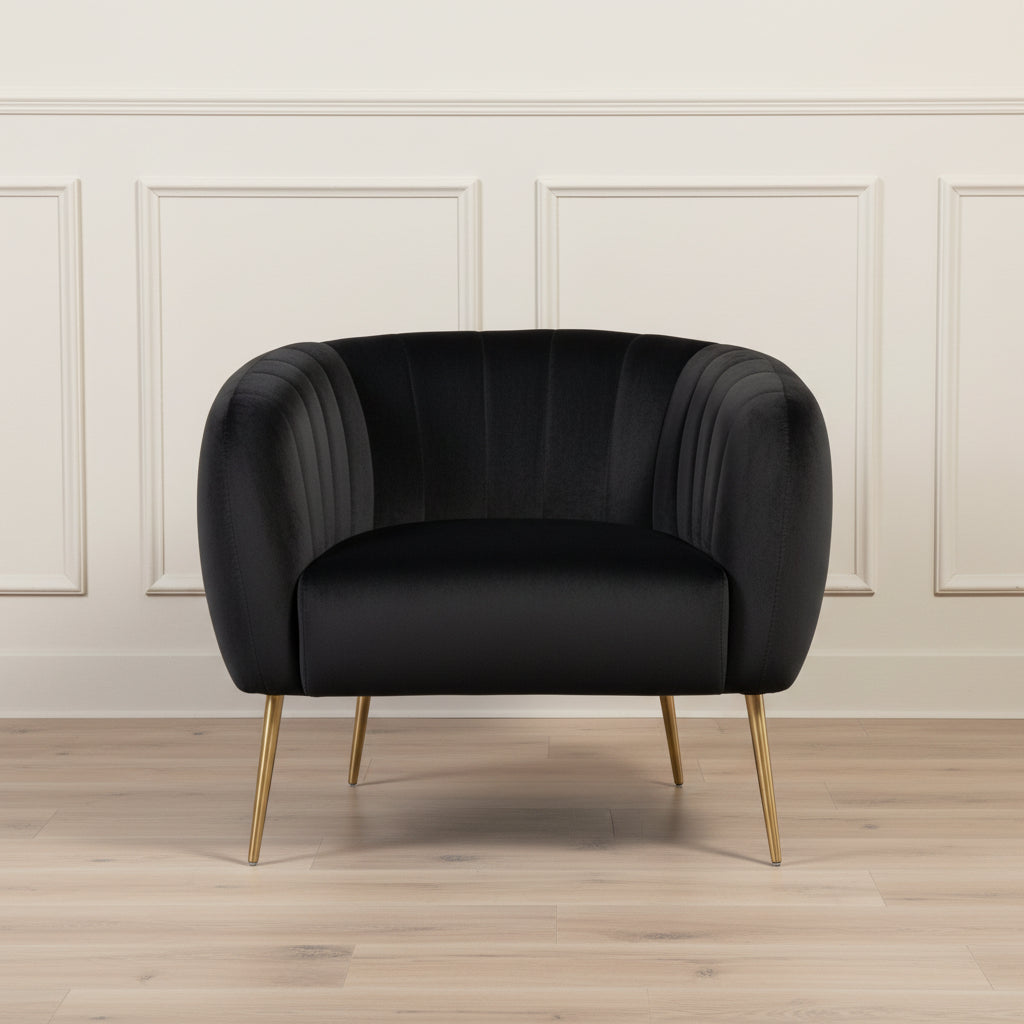 black velvet armchair with gold legs