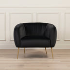 black velvet armchair with gold legs